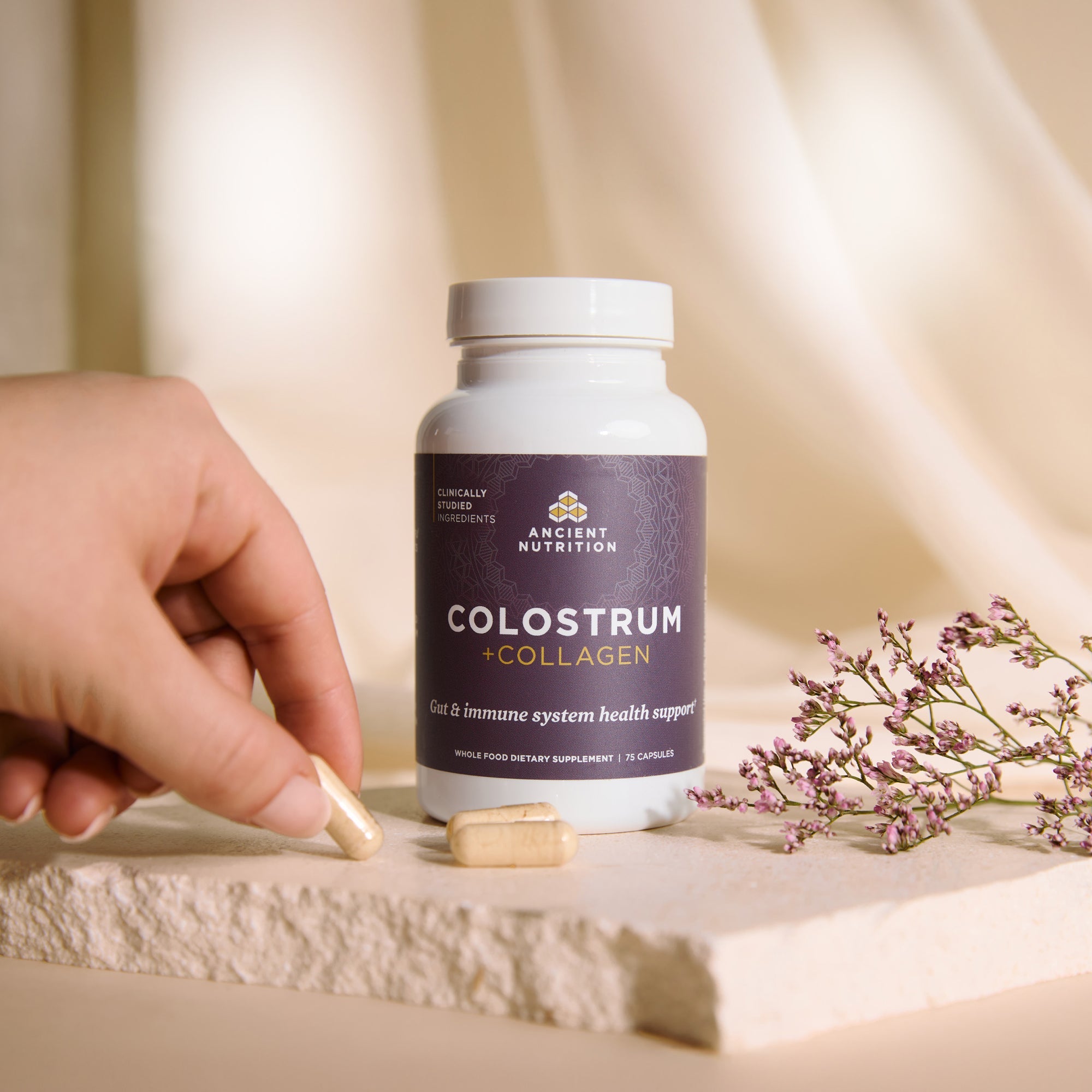 a bottle of Colostrum + Collagen Capsules (25 Servings) 