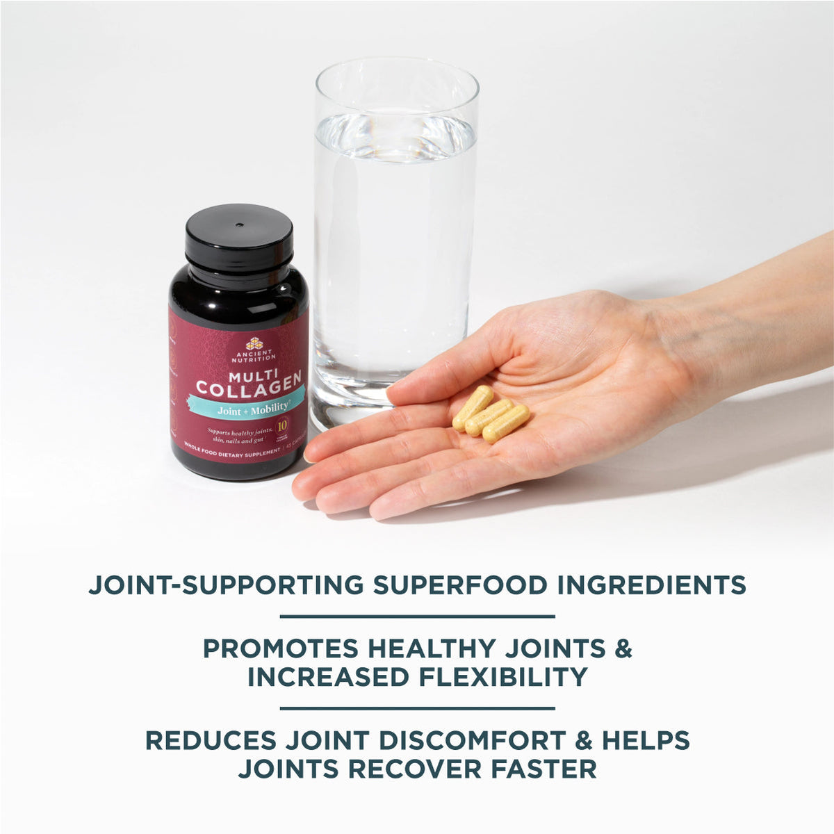 a person holding a bottle of multi collagen capsules joint + mobility