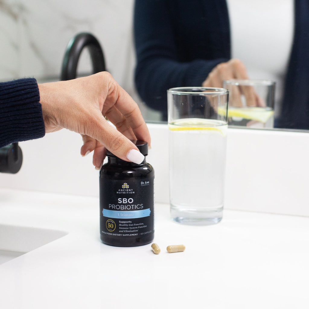 SBO Probiotics Ultimate Capsules bottle on a counter
