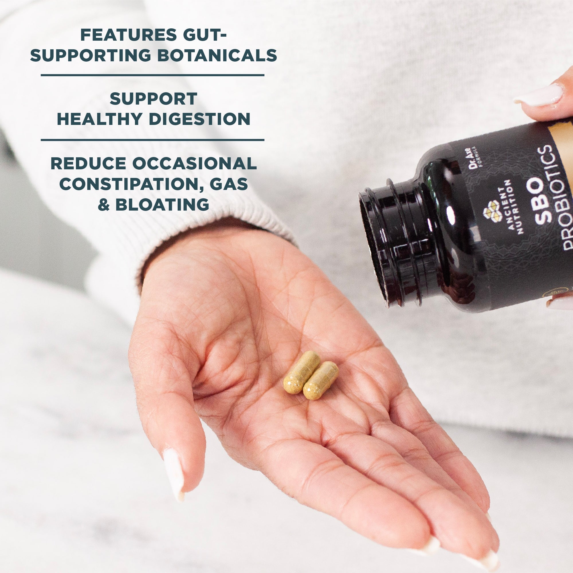 SBO Probiotics Gut Restore Capsules  in plam of hand