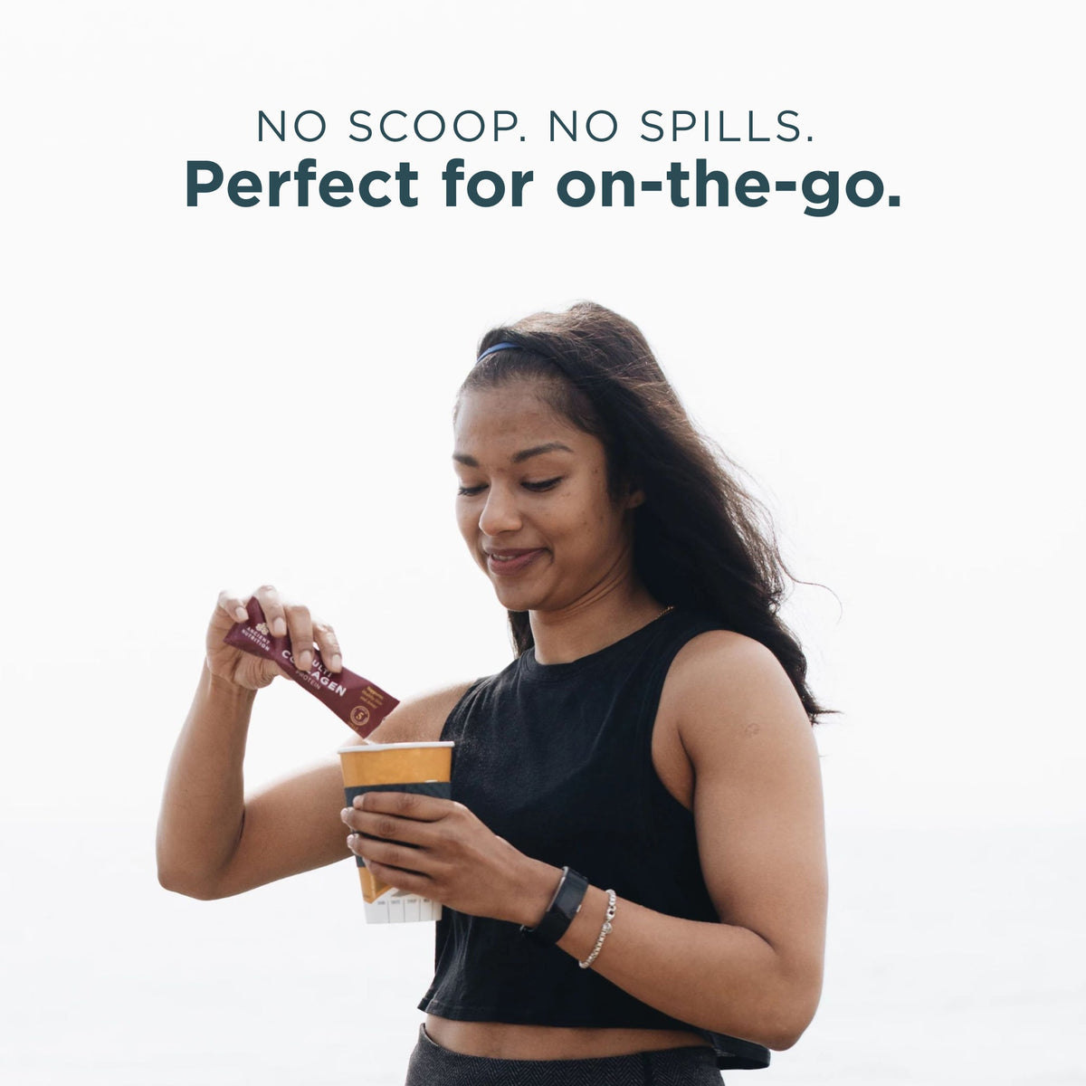 Woman holding a cup and a spoon with text 'No scoop. No spills. Perfect for on-the-go.'