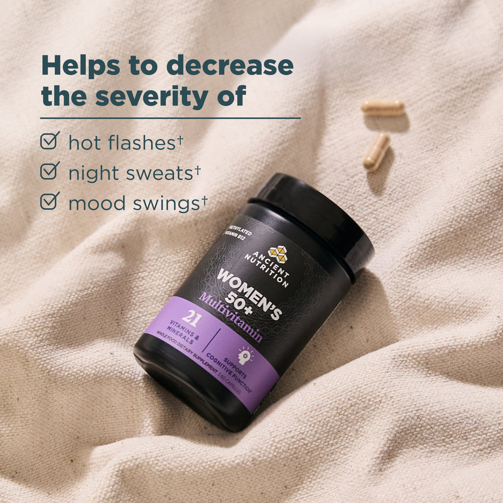 Women's multivitamin supplement bottle with text on a textured fabric background