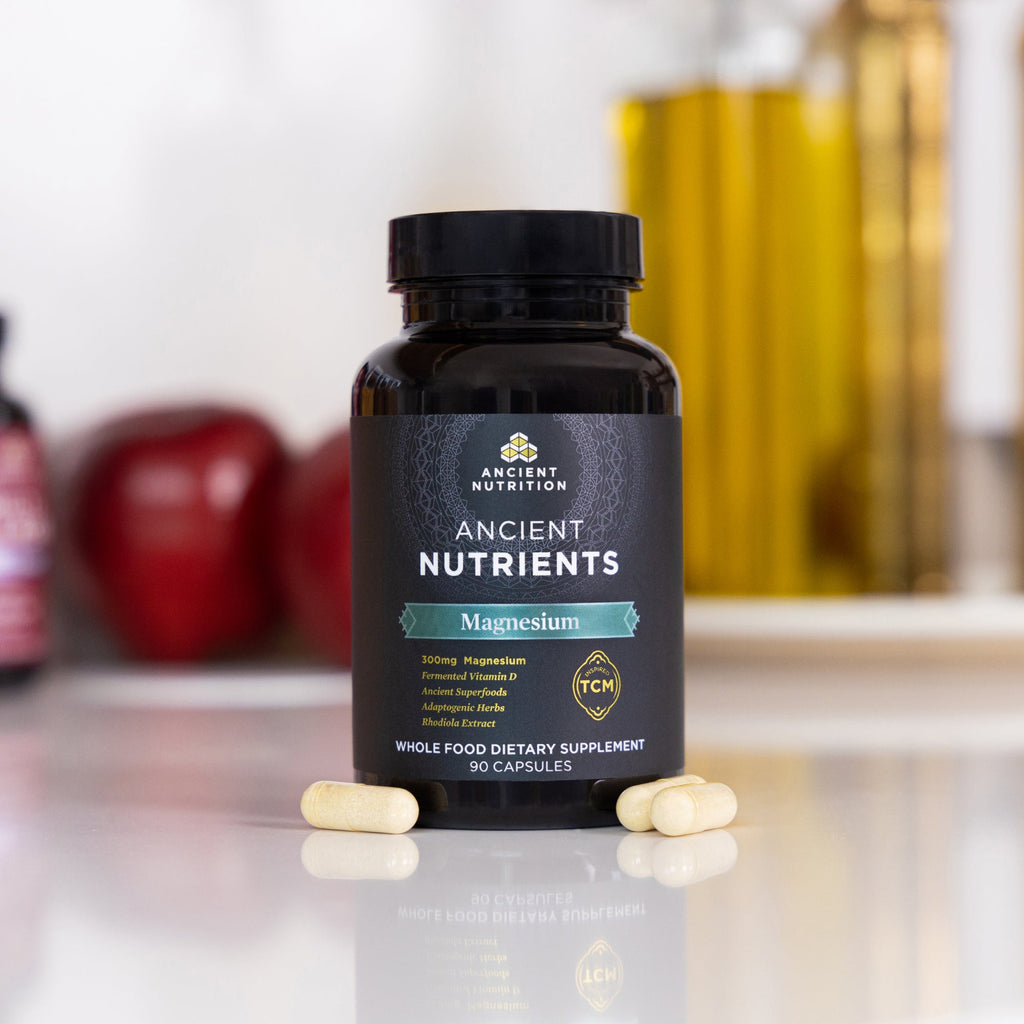 a bottle of Ancient Nutrients Magnesium Capsules (30 Servings) on a counter top