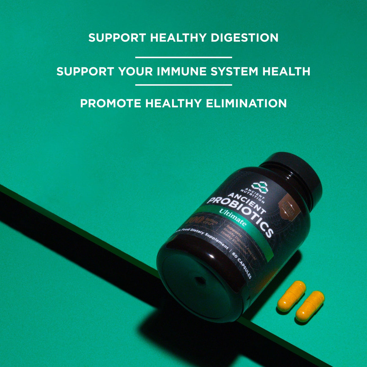 a bottle of Ancient Probiotics Ultimate Capsules on a green background