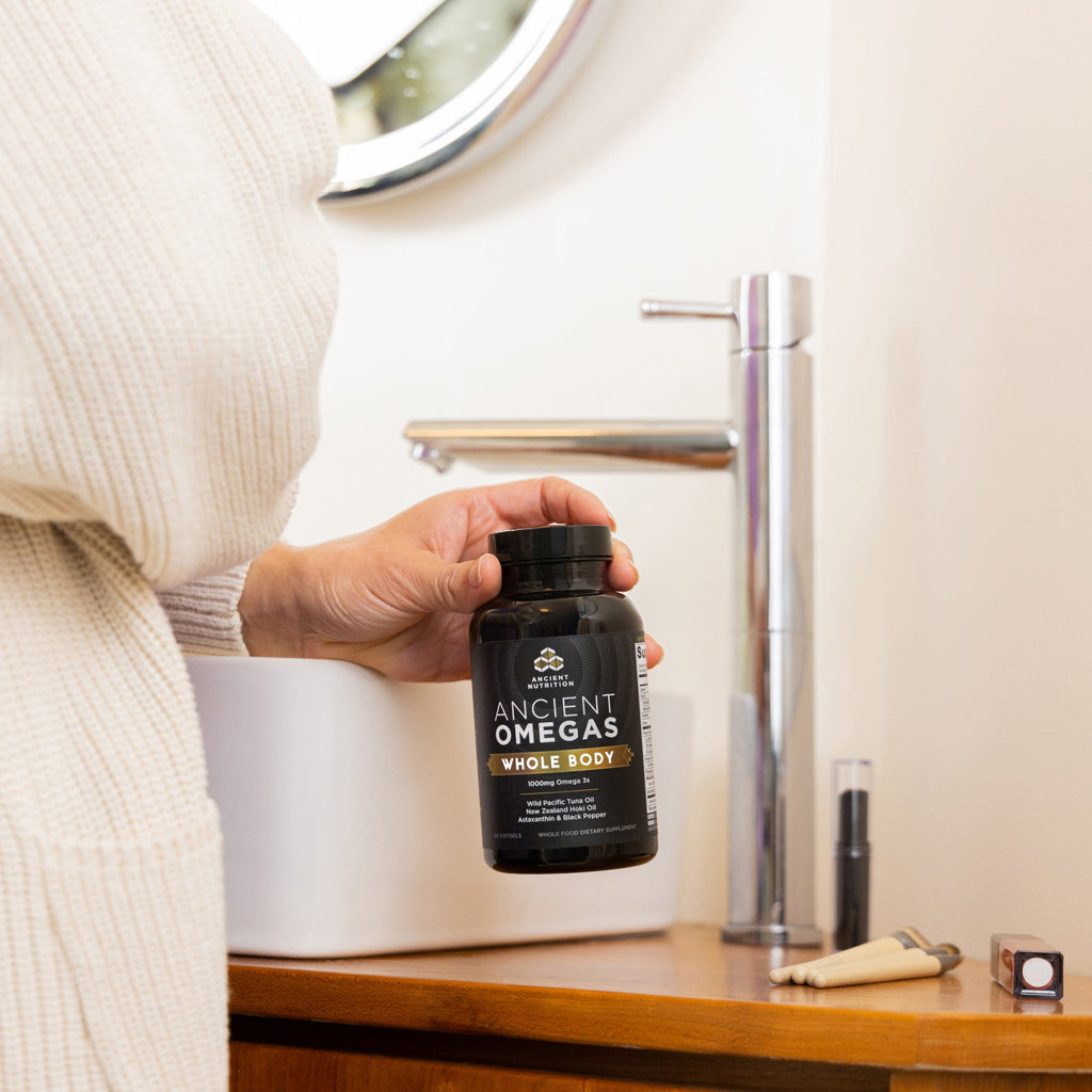 Omega-3s Whole Body (90 Softgels) bottle on a vanity