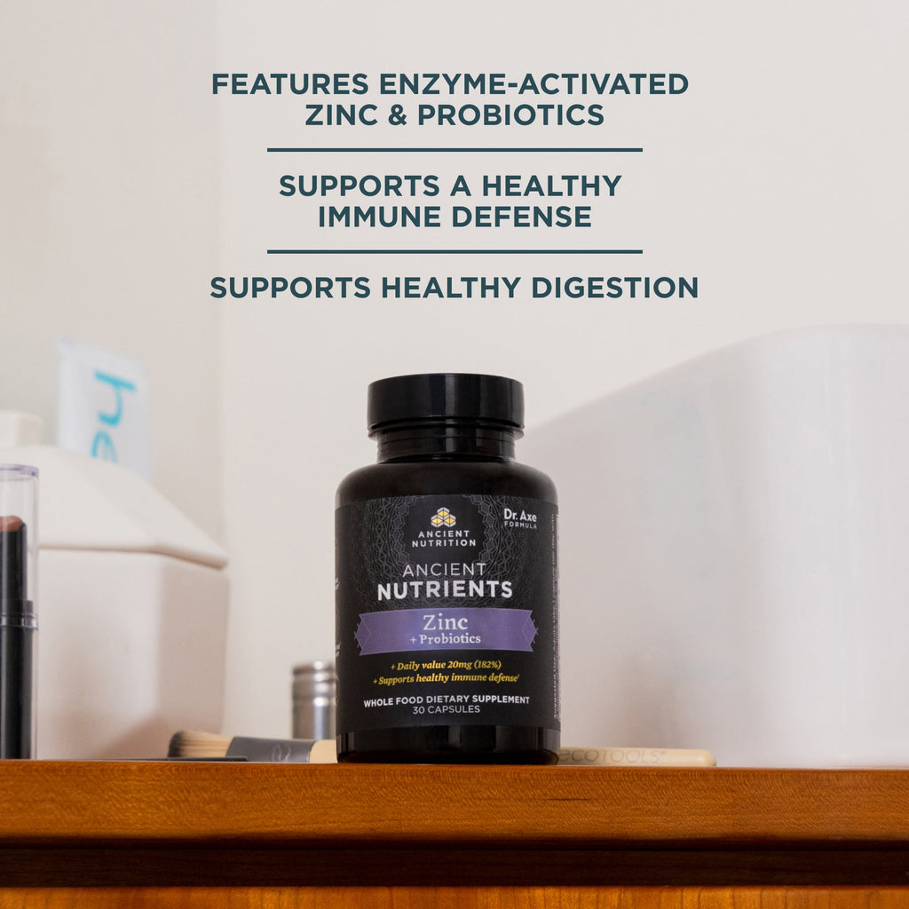 a bottle of Ancient Nutrients Zinc + Probiotics Capsules (30 Servings) on a wooden shelf