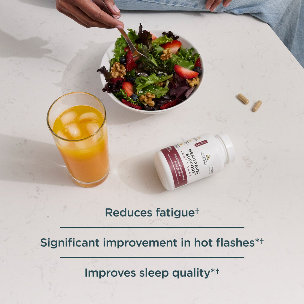 a bottle of Menopause Support + Collagen Capsules next to a salad