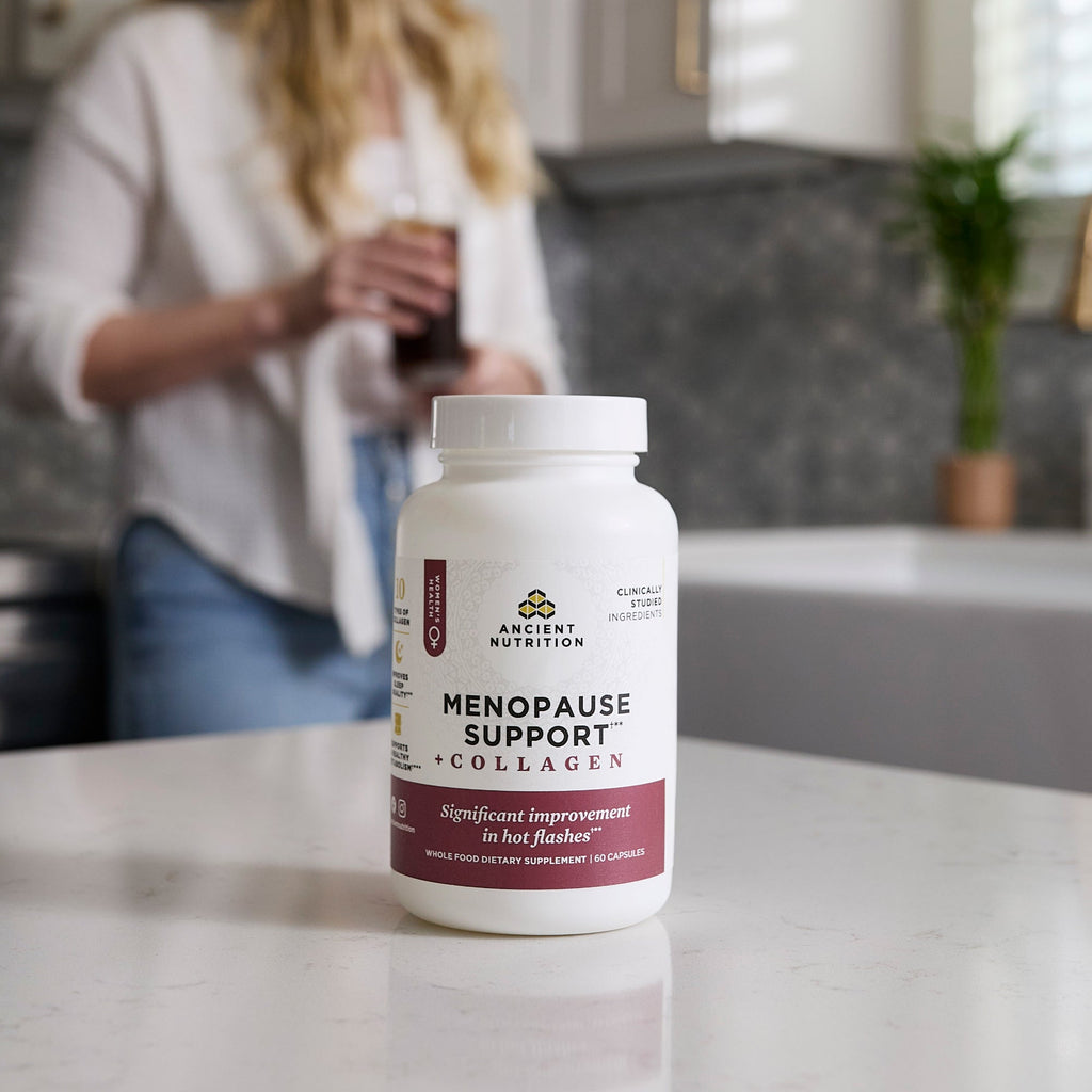 a bottle of Menopause Support + Collagen Capsules on a kitchen counter