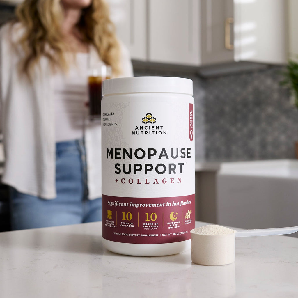 a bottle of Menopause Support + Collagen Powder Vanilla on a counter top