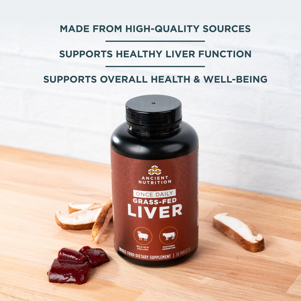 Grass-Fed Liver Once Daily Tablets bottle on a wood table top