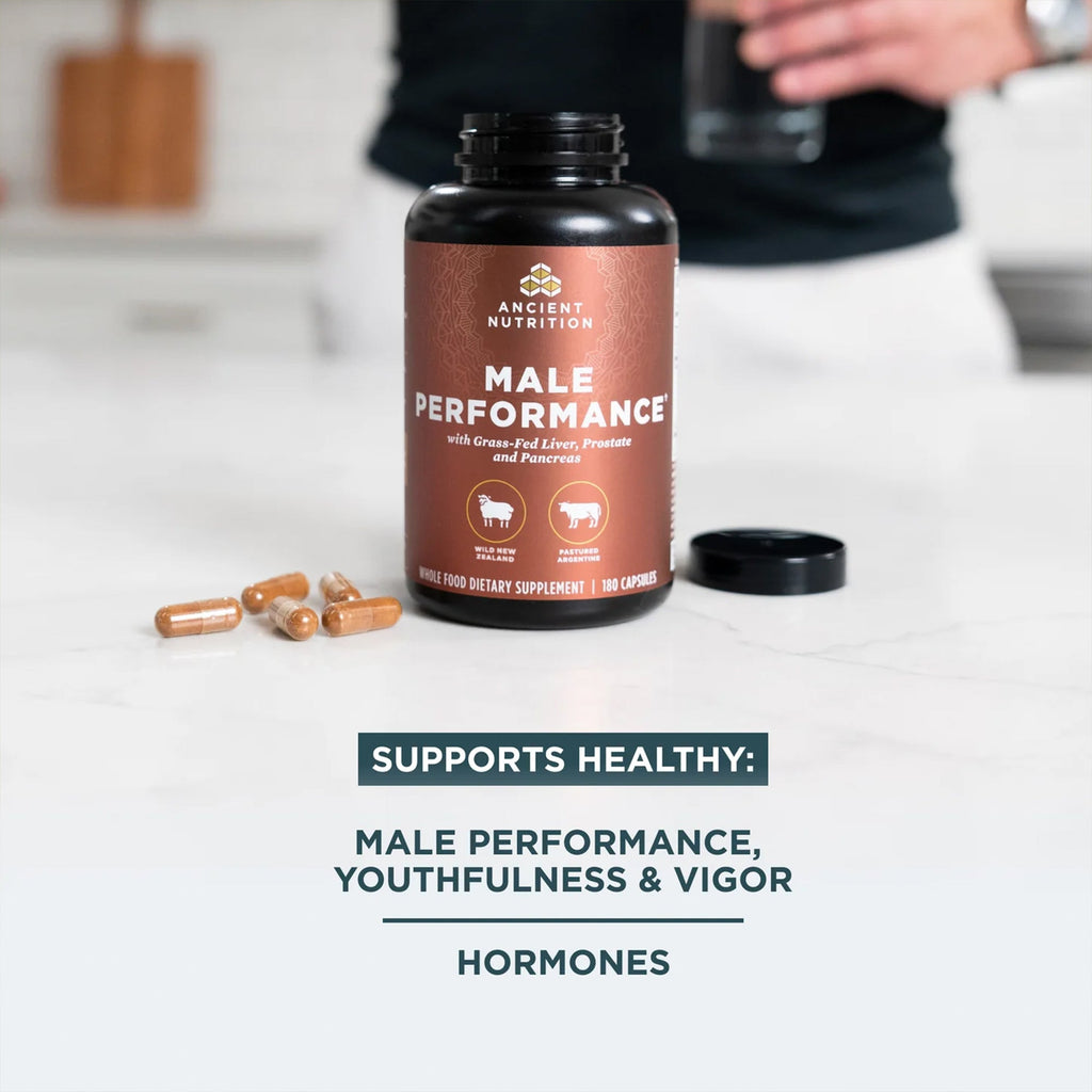 a bottle of Male Performance Capsules (30 Servings) on a counter top
