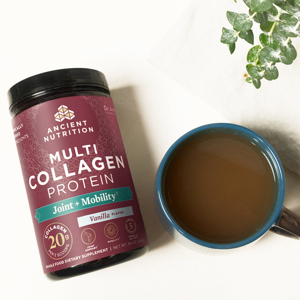 Multi Collagen Protein Joint & Mobility Powder Vanilla bottle next to a coffee cup