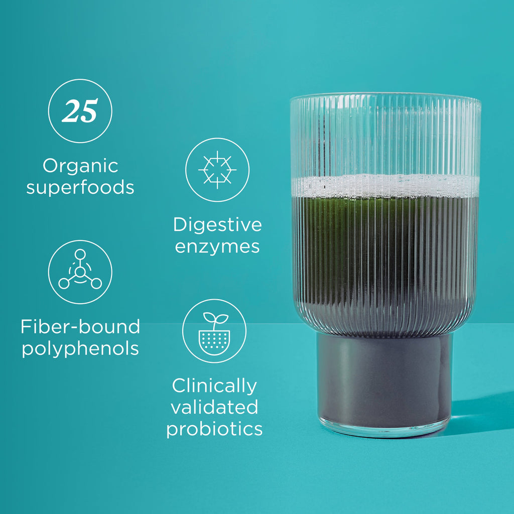 Glass of green juice with health benefits listed on a teal background